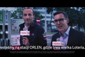 Robert Kubica z Maciejem Kurzajewskim reklamuje loterię Orlenu