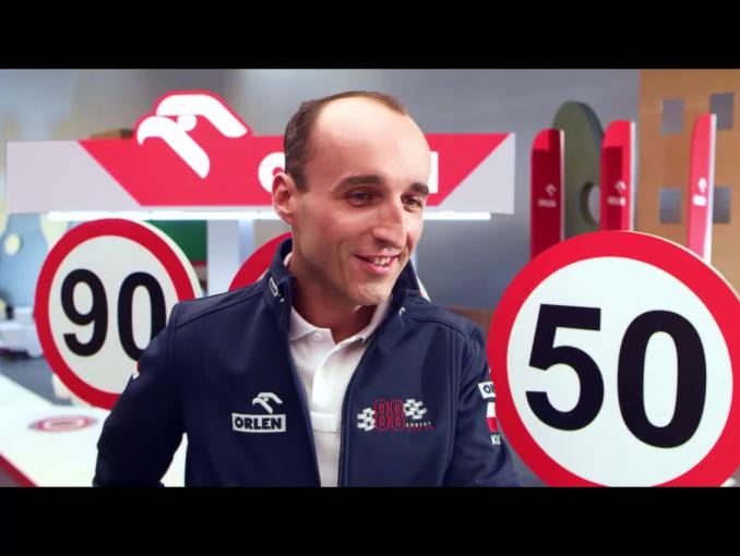 Robert Kubica z dziećmi edukuje w kampanii #DobryKierowca PKN Orlen - prędkość
