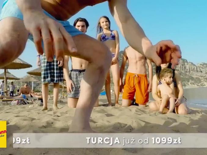 Neckermann reklamuje „wakacje pełne słońca i beztroski”
